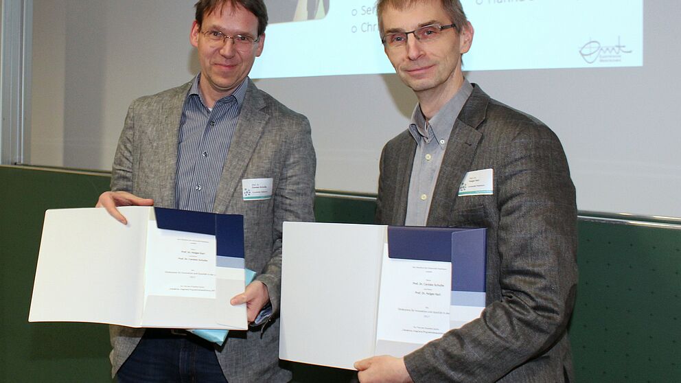 Foto: Prof. Dr. Carsten Schulte (l.) und Prof. Dr. Holger Karl
